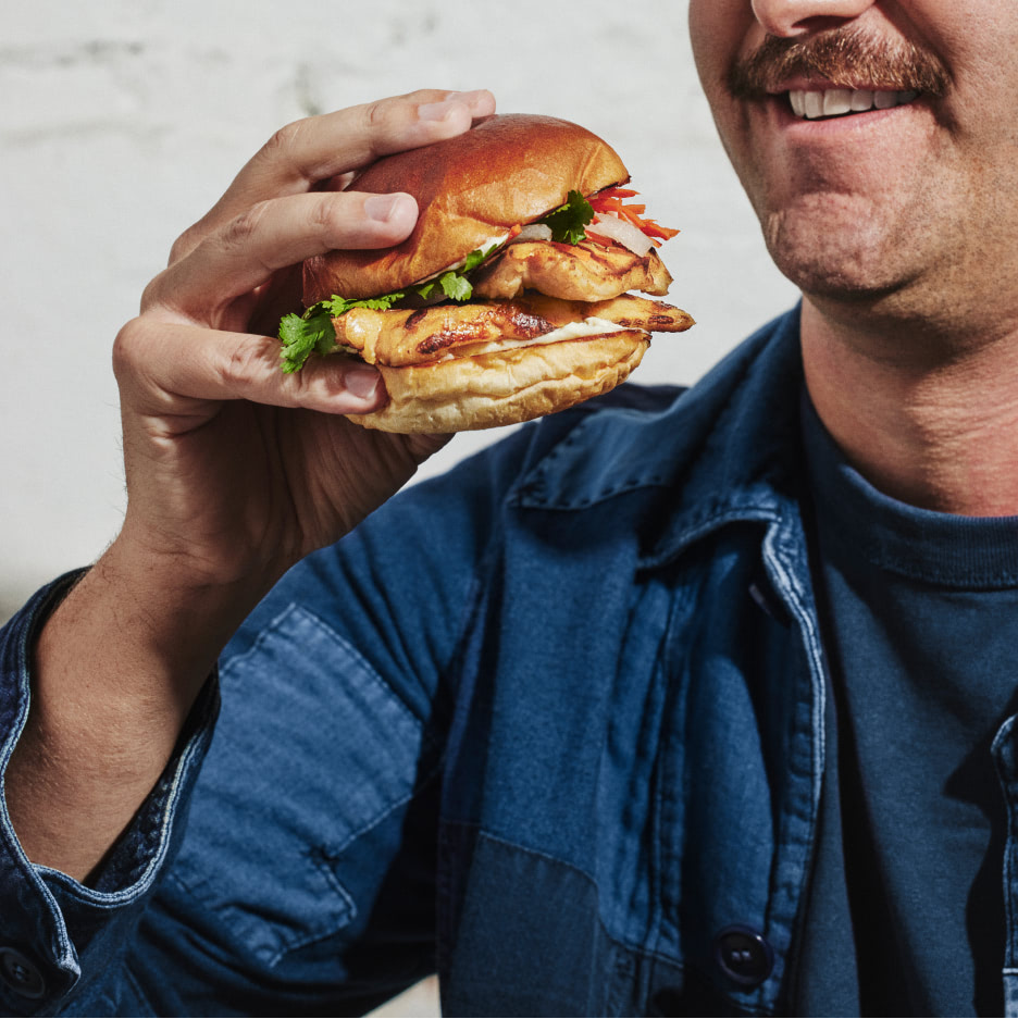 man eating a burger